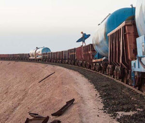 A long freight train journey across the Sahara desert